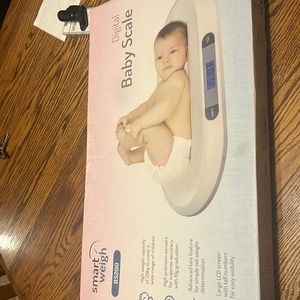 Digital baby scale ,  weight capacity 44 lbs. barely used still with box